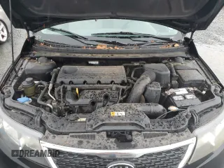 2010 Kia Forte EX z VIN KNAFU4A26A5861366, wystawiony jako Copart lot #51791605 z przebiegiem 161 093 mil mil oraz Szkoda całkowita • Salvage title. Historia ofert i sprzedaży dostępna na DreamBid. Obrazek 11.