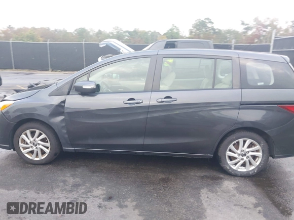 2015 Mazda 5 Sport with VIN JM1CW2BL3F0188052, listed as a IAAI auction lot 40777036 with 69,405 mi miles. Bid and sale history available at carsss.com. Image 14.