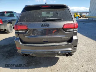 2018 Jeep Grand Cherokee Trackhawk with VIN 1C4RJFN96JC377074, listed as a Copart auction lot 53305975 with 27,625 mi miles and Salvage title. Bid and sale history available at DreamBid. Image 6.