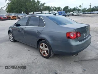 2009 Volkswagen Jetta SE z VIN 3VWRM71K99M167159, wystawiony jako IAAI lot #42409998 z przebiegiem 78 459 mil mil oraz . Historia ofert i sprzedaży dostępna na DreamBid. Obrazek 3.