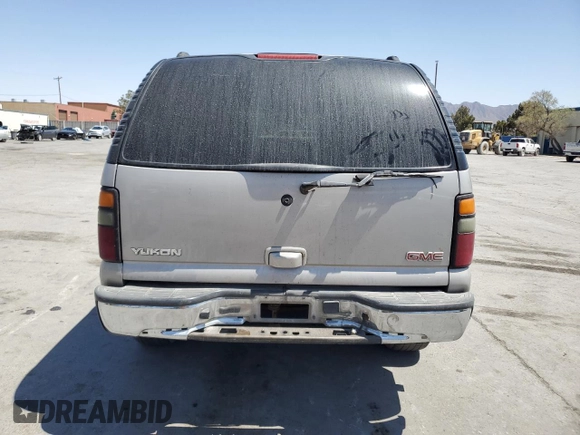 2004 GMC Yukon SLT with VIN 1GKEC13V94J331979, listed as a Copart auction lot 52487075 with 249,779 mi miles and Salvage Title. Bid and sale history available at carsss.com. Image 6.