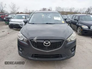 2015 Mazda CX-5 Touring with VIN JM3KE4CY1F0439016, listed as a IAAI auction lot 42039259 with 201,325 mi miles and . Bid and sale history available at carsss.com. Image 12.