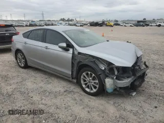 2020 Ford Fusion SE with VIN 3FA6P0HD0LR147717, listed as a Copart auction lot 55420575 with 133,646 mi miles and Salvage title. Bid and sale history available at DreamBid. Image 4.