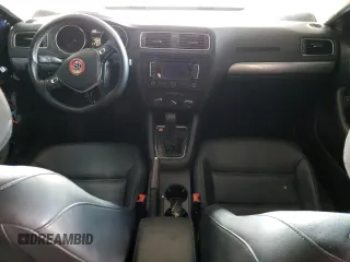 2015 Volkswagen Jetta SE with VIN 3VWD17AJ4FM319385, listed as a Copart auction lot 58380125 with 124,877 mi miles and Salvage title. Bid and sale history available at DreamBid. Image 8.