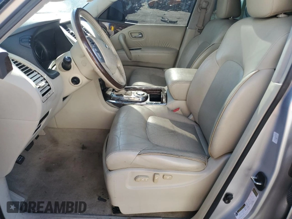 2015 Infiniti QX80 z VIN JN8AZ2NF3F9571753, wystawiony jako Copart lot #55229565 z przebiegiem 115 777 mil mil oraz Czysty tytuł • Clean title. Historia ofert i sprzedaży dostępna na DreamBid. Obrazek 7.