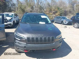 2022 Jeep Cherokee Trailhawk with VIN 1C4PJMBX4ND535037, listed as a IAAI auction lot 41779140 with 49,733 mi miles. Bid and sale history available at carsss.com. Image 12.