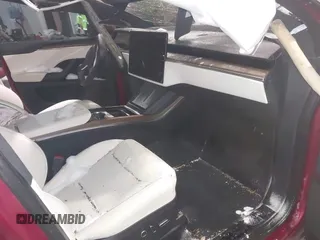2023 Tesla Model X with VIN 7SAXCDE51PF403632, listed as a IAAI auction lot 41328722 with Not Provided miles and . Bid and sale history available at DreamBid. Image 5.