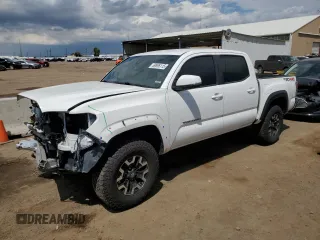 2022 Toyota Tacoma SR with VIN 3TMCZ5AN7NM454051, listed as a Copart auction lot 59896115 with 70,202 mi miles and Salvage title. Bid and sale history available at DreamBid. Image 1.