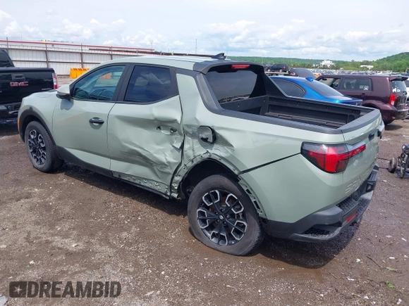 2022 Hyundai Santa Cruz SEL with VIN 5NTJB4AEXNH034989, listed as a IAAI auction lot 42176050 with 27,297 mi miles and . Bid and sale history available at DreamBid. Image 3.