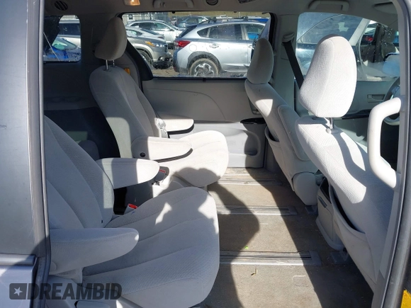 2013 Toyota Sienna LE with VIN 5TDJK3DC8DS056730, listed as a IAAI auction lot 41141247 with 166,579 mi miles and . Bid and sale history available at DreamBid. Image 8.