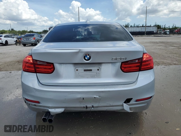 2013 BMW 3 Series 328i with VIN WBA3C1G52DNR49440, listed as a Copart auction lot 61546685 with 118,308 mi miles and Salvage title. Bid and sale history available at DreamBid. Image 6.