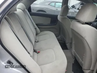 2006 Kia Spectra EX z VIN KNAFE121565316347, wystawiony jako Copart lot #57169865 z przebiegiem 82 782 mil mil oraz Czysty tytuł • Clean title. Historia ofert i sprzedaży dostępna na DreamBid. Obrazek 10.