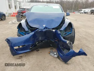 2025 Tesla Model Y Long Range with VIN 7SAYGDED9SF248370, listed as a IAAI auction lot 41336869 with 2,499 mi miles and . Bid and sale history available at DreamBid. Image 13.