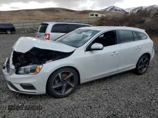 2015 Volvo V60 z VIN YV1902SS6F1228244, wystawiony jako Copart lot #43789925 z przebiegiem 69 835 mil mil oraz Szkoda całkowita • Salvage title. Historia ofert i sprzedaży dostępna na DreamBid. Obrazek 1.