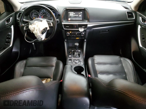 2016 Mazda CX-5 Grand Touring with VIN JM3KE2DY8G0627259, listed as a Copart auction lot 47102805 with 89,138 mi miles and Salvage Title. Bid and sale history available at carsss.com. Image 8.