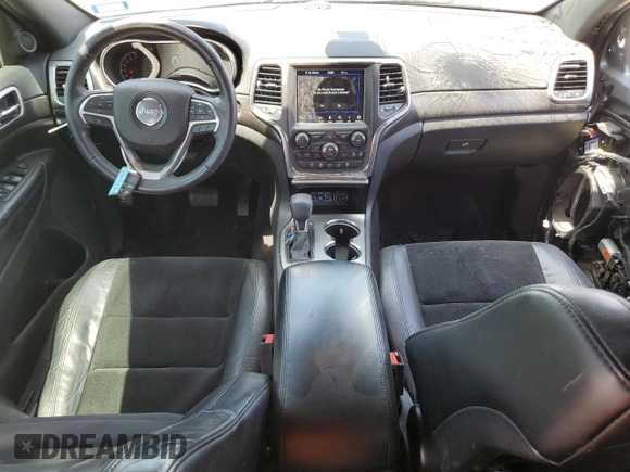 2018 Jeep Grand Cherokee Laredo with VIN 1C4RJFAG4JC272683, listed as a Copart auction lot 56823455 with 122,778 mi miles and Salvage title. Bid and sale history available at DreamBid. Image 8.