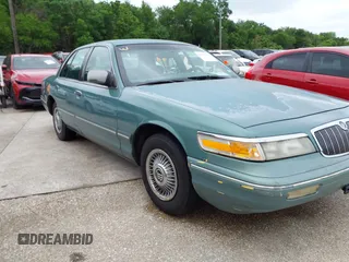 1997 Mercury Grand Marquis GS z VIN 2MELM74W8VX735986, wystawiony jako IAAI lot #42127919 z przebiegiem 135 895 mil mil oraz . Historia ofert i sprzedaży dostępna na DreamBid. Obrazek 6.