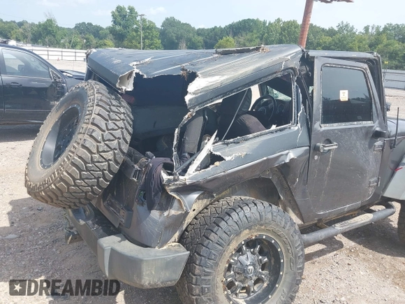 2014 Jeep Wrangler Sport with VIN 1C4AJWAGXEL233647, listed as a IAAI auction lot 39993785 with Not Provided miles and . Bid and sale history available at DreamBid. Image 6.