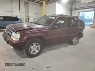 1996 Jeep Grand Cherokee Laredo with VIN 1J4EX58S5TC133225, listed as a Copart auction lot 49132214 with 233,886 mi miles and Non Repairable. Bid and sale history available at carsss.com. Image 1.