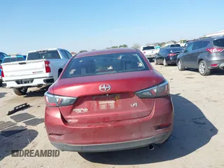 2016 Scion iA with VIN 3MYDLBZVXGY108176, listed as a IAAI auction lot 41590603 with 227,001 mi miles. Bid and sale history available at carsss.com. Image 16.