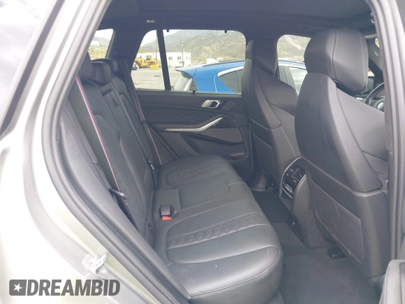 2022 BMW X5 M with VIN 5YMJU0C00N9M59253, listed as a IAAI auction lot 41476833 with 27,813 mi miles. Bid and sale history available at carsss.com. Image 8.