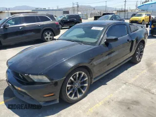 2012 Ford Mustang GT Premium с VIN 1ZVBP8CF9C5278936, выставлен на аукционе Copart как лот 57905515 с пробегом 128 210 миль миль и Списание • Salvage title. История ставок и продаж доступна на DreamBid. Изображение 1.