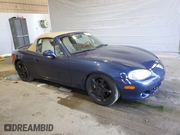 2001 Mazda MX-5 Miata with VIN JM1NB353510209224, listed as a Copart auction lot 51736955 with 103,732 mi miles and Salvage Title. Bid and sale history available at DreamBid. Image 4.