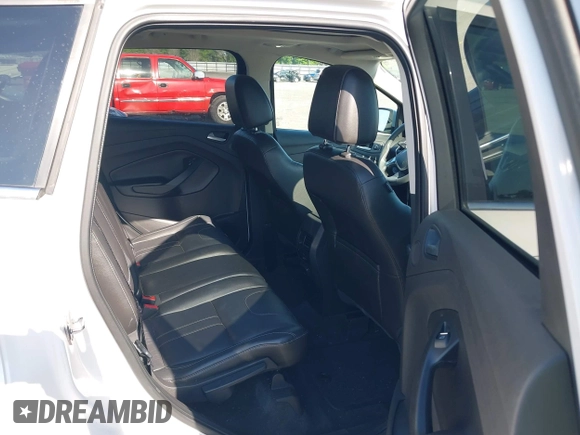 2013 Ford Escape Titanium with VIN 1FMCU0J97DUA70393, listed as a IAAI auction lot 41974106 with 73,548 mi miles and . Bid and sale history available at carsss.com. Image 8.