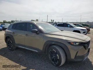 2023 Mazda CX-50 2.5 Turbo Meridian Edition with VIN 7MMVABXY8PN127764, listed as a Copart auction lot 68353004 with 24,209 mi miles and Salvage Title. Bid and sale history available at carsss.com. Image 4.