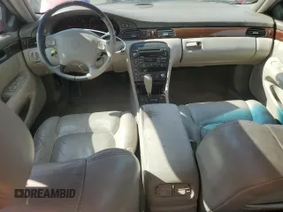 1998 Cadillac Seville SLS z VIN 1G6KS54Y1WU933605, wystawiony jako Copart lot #74598874 z przebiegiem 220 398 mil mil oraz Szkoda całkowita • Salvage title. Historia ofert i sprzedaży dostępna na DreamBid. Obrazek 8.