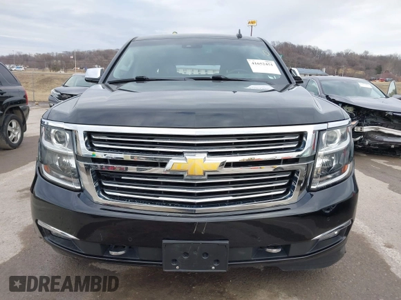 2019 Chevrolet Suburban Premier with VIN 1GNSKJKC7KR261826, listed as a IAAI auction lot 41652451 with 127,032 mi miles and . Bid and sale history available at DreamBid. Image 12.
