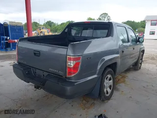 2009 Honda Ridgeline RT with VIN 2HJYK16279H501015, listed as a IAAI auction lot 41996301 with 124,716 mi miles. Bid and sale history available at carsss.com. Image 4.