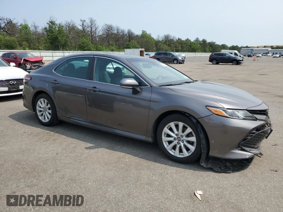 2018 Toyota Camry LE with VIN 4T1B11HK1JU141022, listed as a Copart auction lot 60135785 with 112,652 mi miles and Salvage title. Bid and sale history available at DreamBid. Image 4.