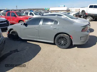 2019 Dodge Charger R/T z VIN 2C3CDXCTXKH607784, wystawiony jako IAAI lot #41667401 z przebiegiem 120 644 mil mil oraz . Historia ofert i sprzedaży dostępna na DreamBid. Obrazek 14.