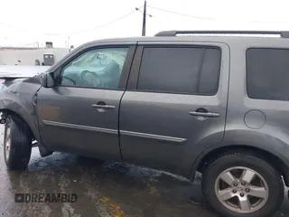 2011 Honda Pilot EX with VIN 5FNYF3H49BB026174, listed as a IAAI auction lot 41795460 with 201,488 mi miles and . Bid and sale history available at carsss.com. Image 14.