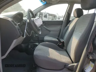 2006 Ford Focus S с VIN 1FAHP34N06W115926, выставлен на аукционе Copart как лот 59145555 с пробегом 263 717 миль миль и Списание • Salvage title. История ставок и продаж доступна на DreamBid. Изображение 7.