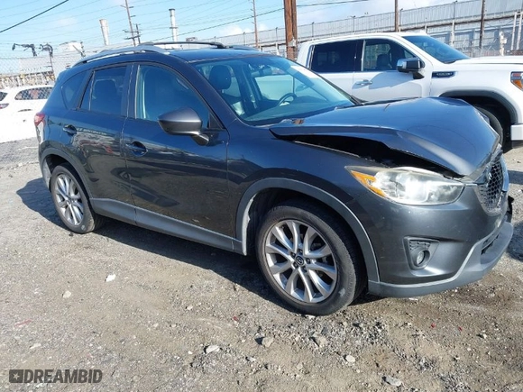 2014 Mazda CX-5 Grand Touring with VIN JM3KE2DY7E0405115, listed as a IAAI auction lot 41939899 with 147,452 mi miles. Bid and sale history available at carsss.com. Image 1.