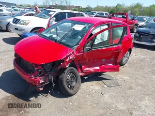 2012 Toyota Yaris L with VIN JTDKTUD32CD536389, listed as a IAAI auction lot 42020928 with 138,379 mi miles. Bid and sale history available at carsss.com. Image 2.