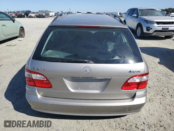 2006 Mercedes-Benz E 500 with VIN WDBUH83J96X194071, listed as a Copart auction lot 71035284 with 121,818 mi miles and Salvage Title. Bid and sale history available at carsss.com. Image 6.