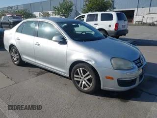 2006 Volkswagen Jetta 2.5L z VIN 3VWRG71K46M711389, wystawiony jako IAAI lot #41999639 z przebiegiem 193 900 mil mil oraz . Historia ofert i sprzedaży dostępna na DreamBid. Obrazek 1.