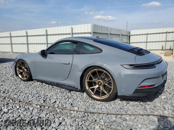 2024 Porsche 911 GT3 with VIN WP0AC2A90RS263286, listed as a Copart auction lot 51160205 with 5,735 mi miles and Salvage Title. Bid and sale history available at carsss.com. Image 2.