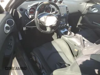 2012 Nissan 370Z с VIN JN1AZ4EH2CM565026, выставлен на аукционе Copart как лот 56129015 с пробегом 113 456 миль миль и Списание • Salvage title. История ставок и продаж доступна на DreamBid. Изображение 8.