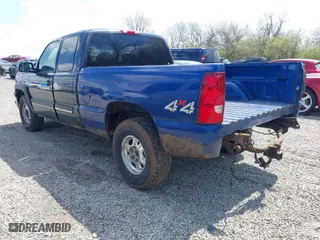 2003 Chevrolet Silverado 1500 LS with VIN 2GCEK19T931157408, listed as a IAAI auction lot 42005843 with 214,348 mi miles. Bid and sale history available at carsss.com. Image 3.