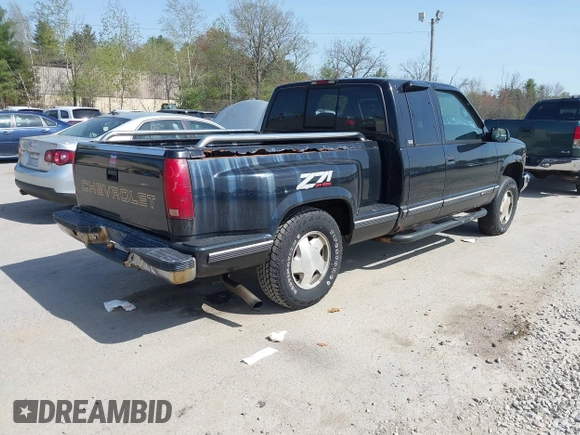 1997 Chevrolet Silverado 1500 with VIN 2GCEK19R3V1159386, listed as a IAAI auction lot 42159684 with 98,577 mi miles and . Bid and sale history available at DreamBid. Image 4.