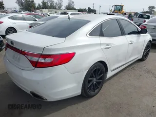 2013 Hyundai Azera with VIN KMHFG4JG3DA250451, listed as a IAAI auction lot 41682203 with 132,229 mi miles and . Bid and sale history available at DreamBid. Image 4.