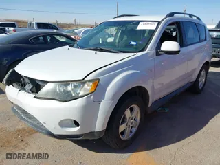 2009 Mitsubishi Outlander ES with VIN JA4LS21W49Z015920, listed as a IAAI auction lot 41845969 with 291,723 mi miles. Bid and sale history available at carsss.com. Image 20.