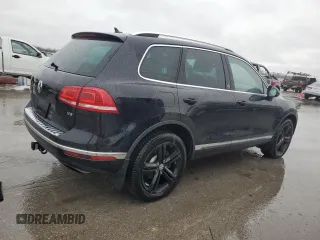 2017 Volkswagen Touareg Wolfsburg Edition z VIN WVGRF7BPXHD006302, wystawiony jako Copart lot #44783475 z przebiegiem 138 244 mil mil oraz Czysty tytuł • Clean title. Historia ofert i sprzedaży dostępna na DreamBid. Obrazek 3.