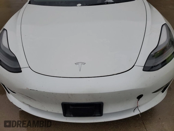 2023 Tesla Model 3 with VIN 5YJ3E1EA9PF510588, listed as a Copart auction lot 51860125 with Not provided miles and Clean title. Bid and sale history available at DreamBid. Image 11.