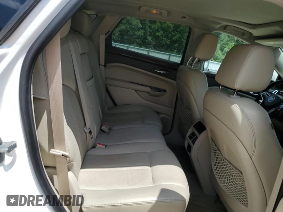 2014 Cadillac SRX Luxury Collection z VIN 3GYFNBE30ES685072, wystawiony jako Copart lot #58122705 z przebiegiem 128 013 mil mil oraz Szkoda całkowita • Salvage title. Historia ofert i sprzedaży dostępna na DreamBid. Obrazek 11.