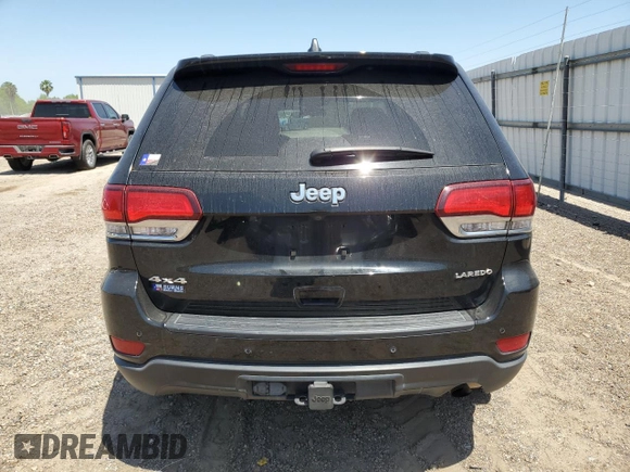2021 Jeep Grand Cherokee Laredo E with VIN 1C4RJFAG8MC817661, listed as a Copart auction lot 52374235 with 25,305 mi miles and Salvage title. Bid and sale history available at DreamBid. Image 6.